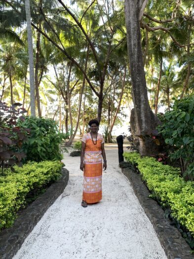 A bure, or concierge, standing on the beach in Turtle Island Fiji