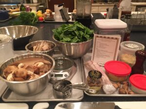 a chef preparing ingredients for a cooking class at the Osthoff Resort in Elkhart Lake Wisconsin