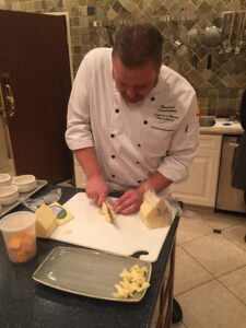 a chef preparing for a cooking class at the Osthoff Resort in Elkhart Lake Wisconsin