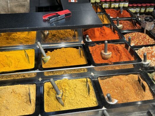 A spice vendor at La Boqueria market in Barcelona