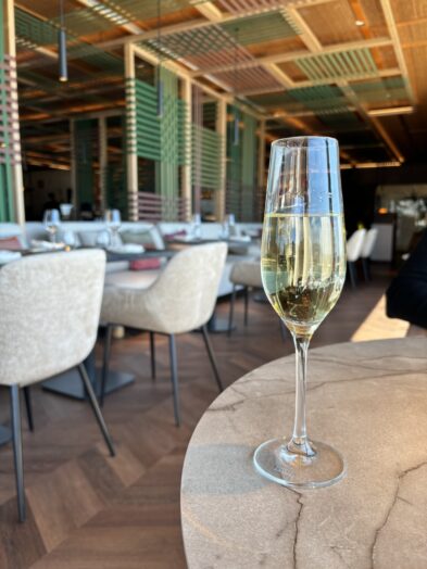 A glass of champagne at a restaurant in the Grand Hyatt Barcelona