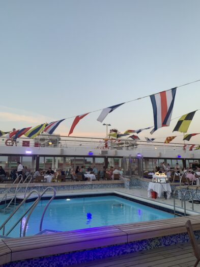 The pool deck during a party on the Seven Seas Splendor