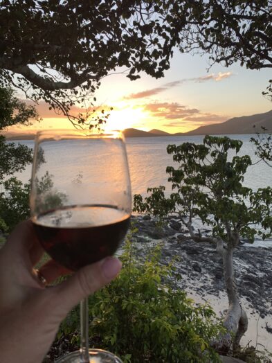 sunset on Fiji seen through a wine glass