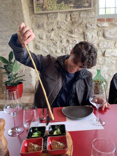 Sampling food during a wine tasting in Italy at Chiesa del Carmine.