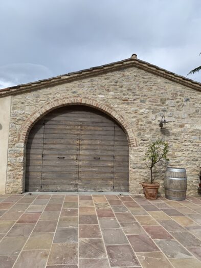 Entrance to the wine cellar at Chiesa del Carmine winery in Italy