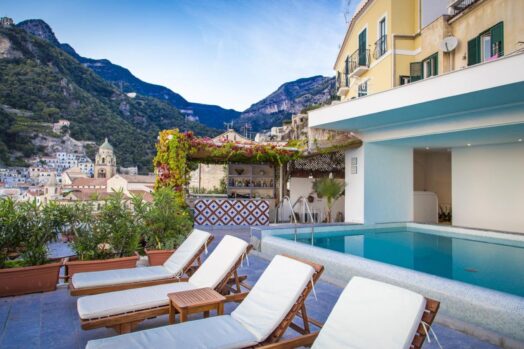 a hotel pool on the amalfi coast