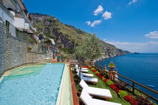 a hotel on the amalfi coast that looks out over the sea