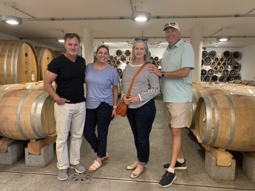 people visiting a winery in tuscany