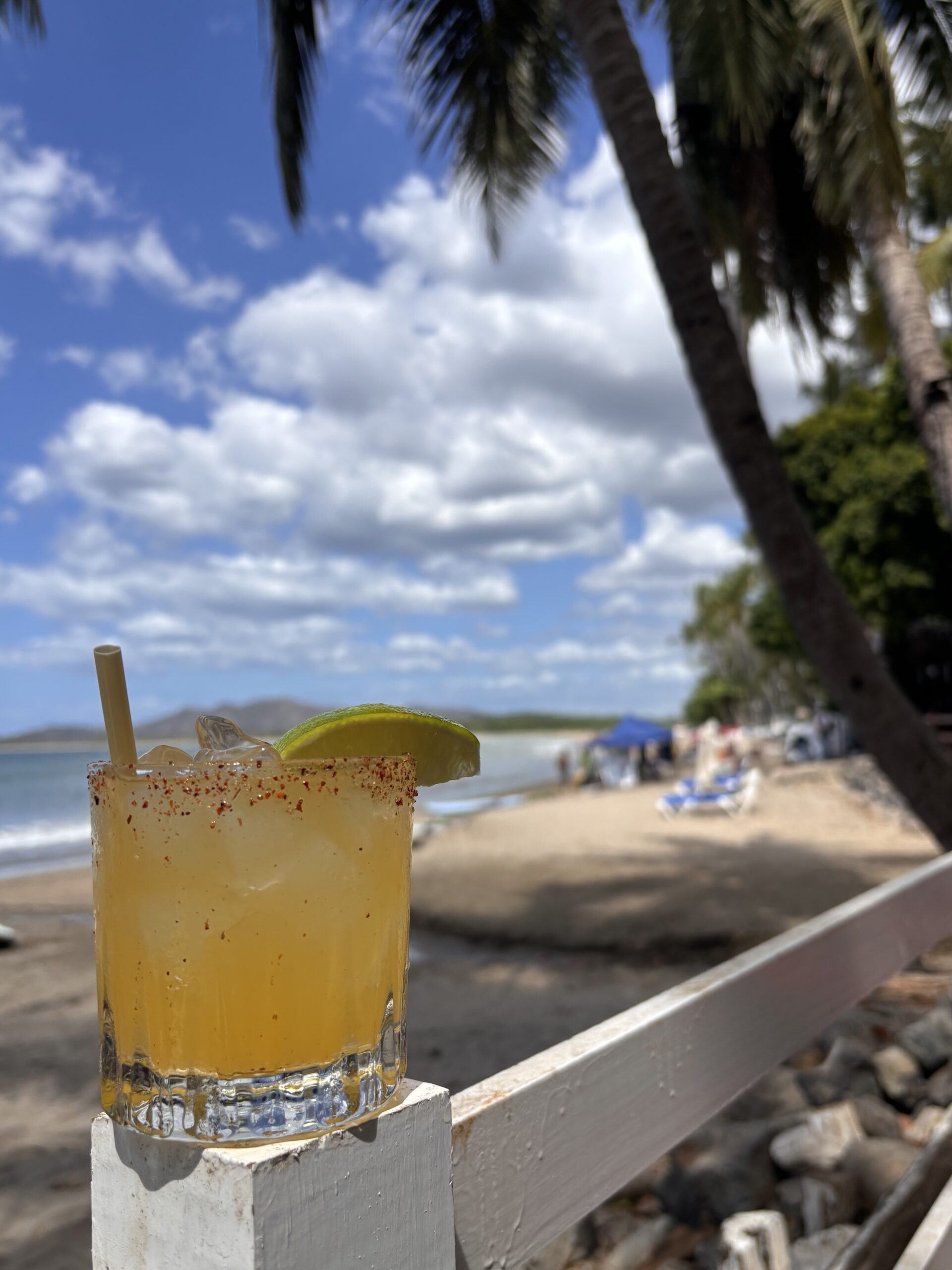 a cocktail on the beach in Playa Langosta