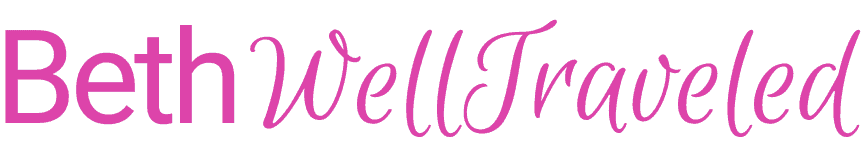 Beth Well Traveled logo with travel-themed design and vibrant pink text.