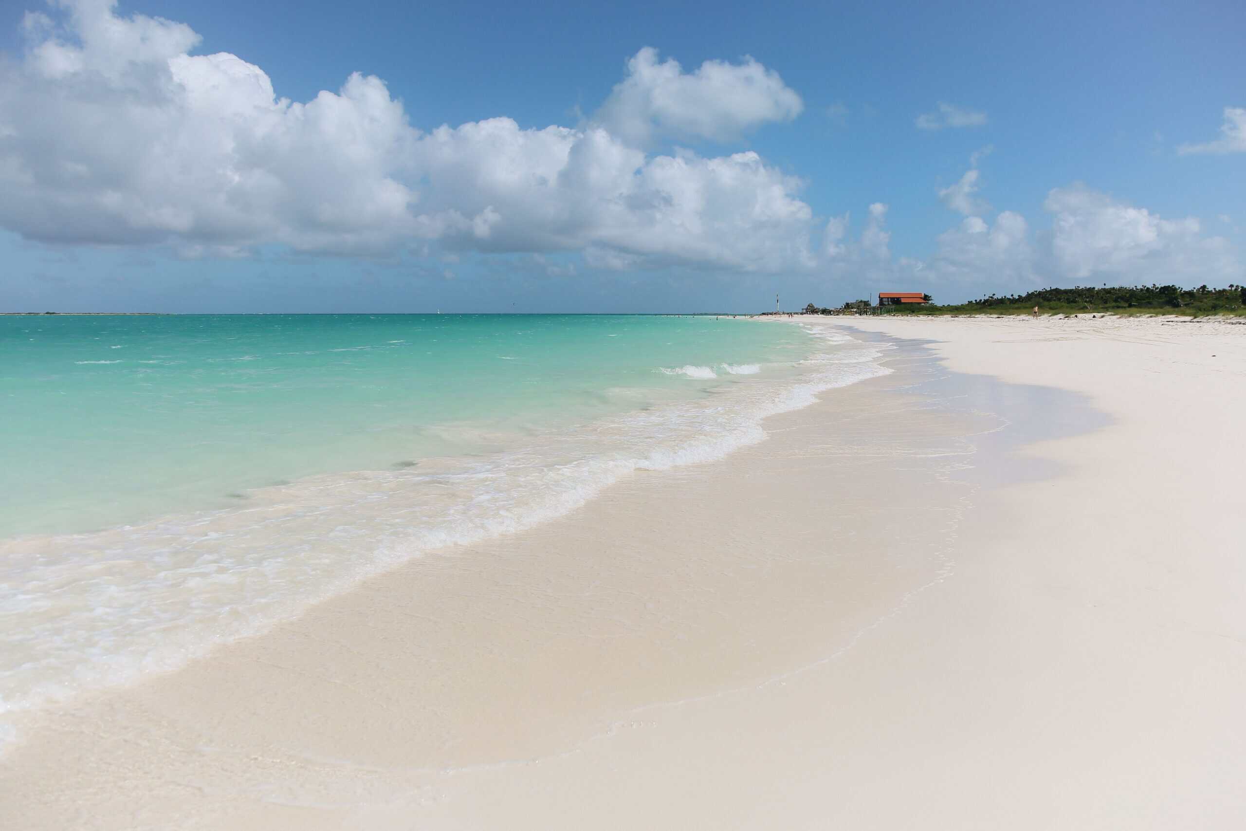 Turks & Caicos Grace Bay Beach with white sand and turquoise water.
